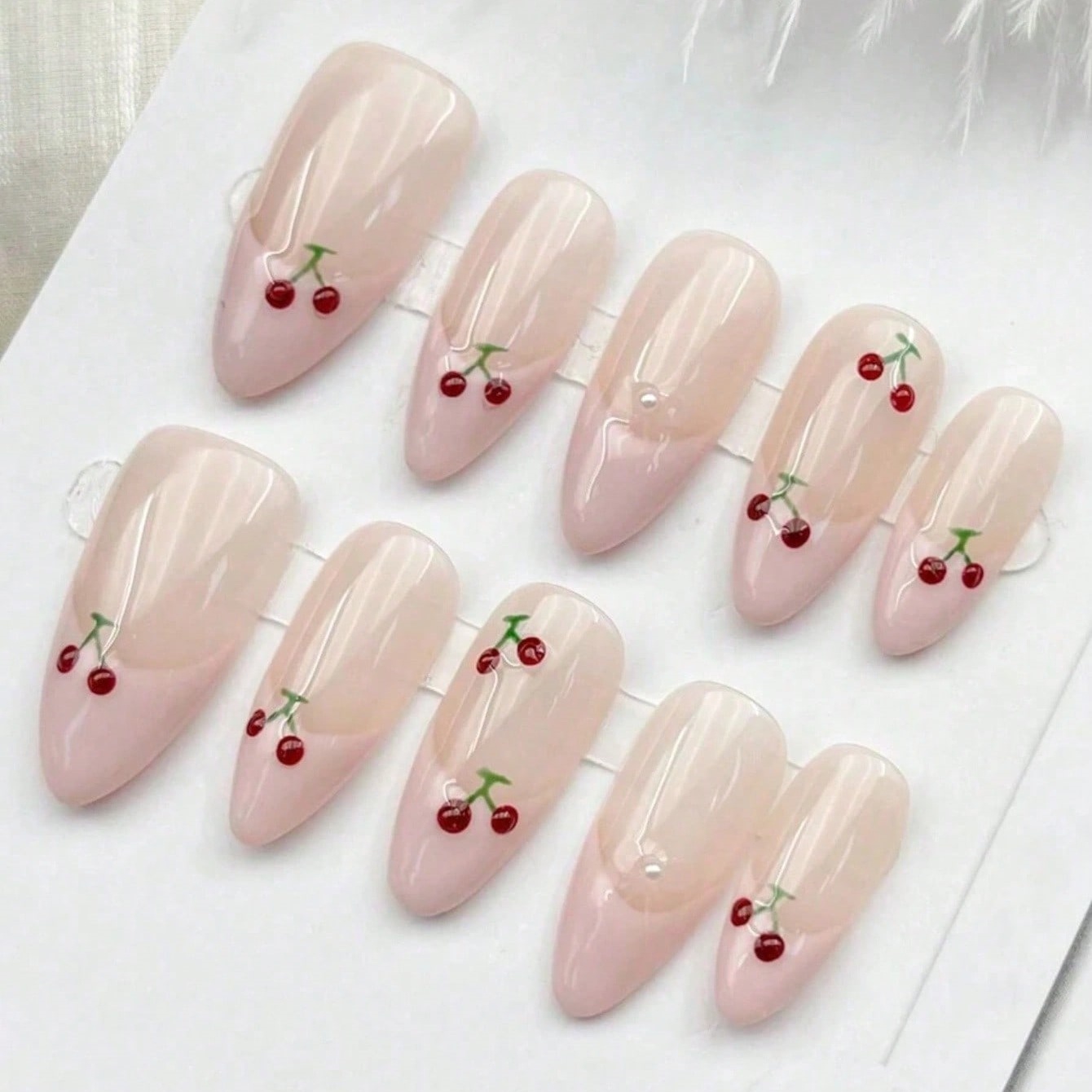 10個入りミディアムアーモンドヌードピンク手描きチェリーネイ - Nail Art Pink のレビューと価格